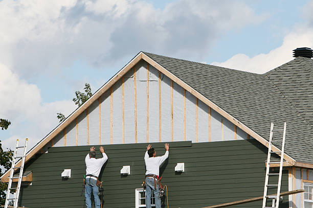 Professional Vinyl Siding technician working in Transfer, PA
